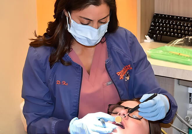 Dr. Ro performing a dental exam